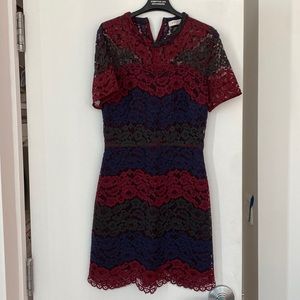 Sandro lace dress with red, blue and black details